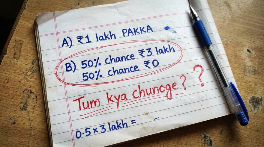 कॉपी पर लिखा: 1 लाख पक्का या 50% चांस 3 लाख